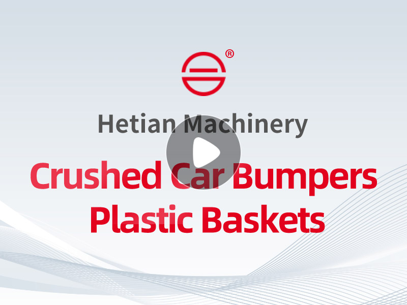 Crushed car bumpers and plastic baskets